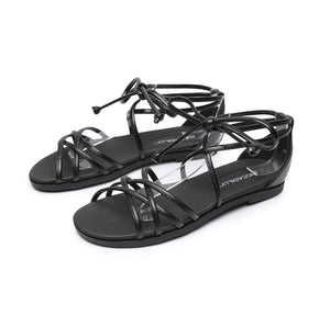 "Elevate Your Look: Piccadilly Black Flat Strappy Lace-up Sandals" (418.060)